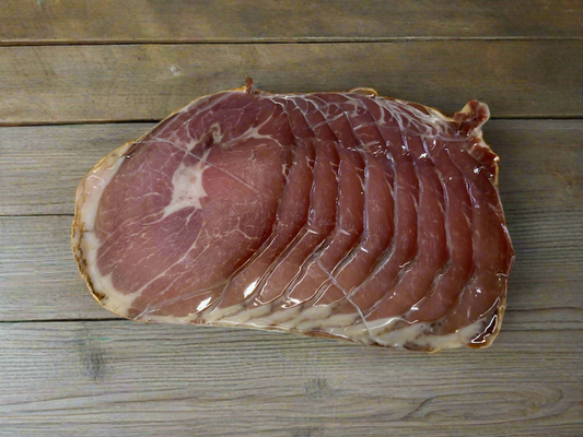 M215 Meacham Country Ham Custom Cooked and sliced in 2# package.     SLICED